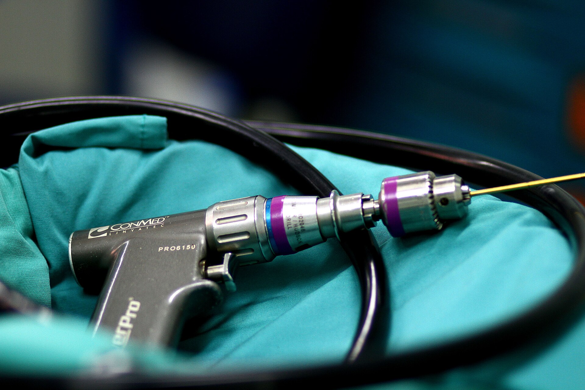 Pneumatic surgical drill used in orthopaedic procedures.